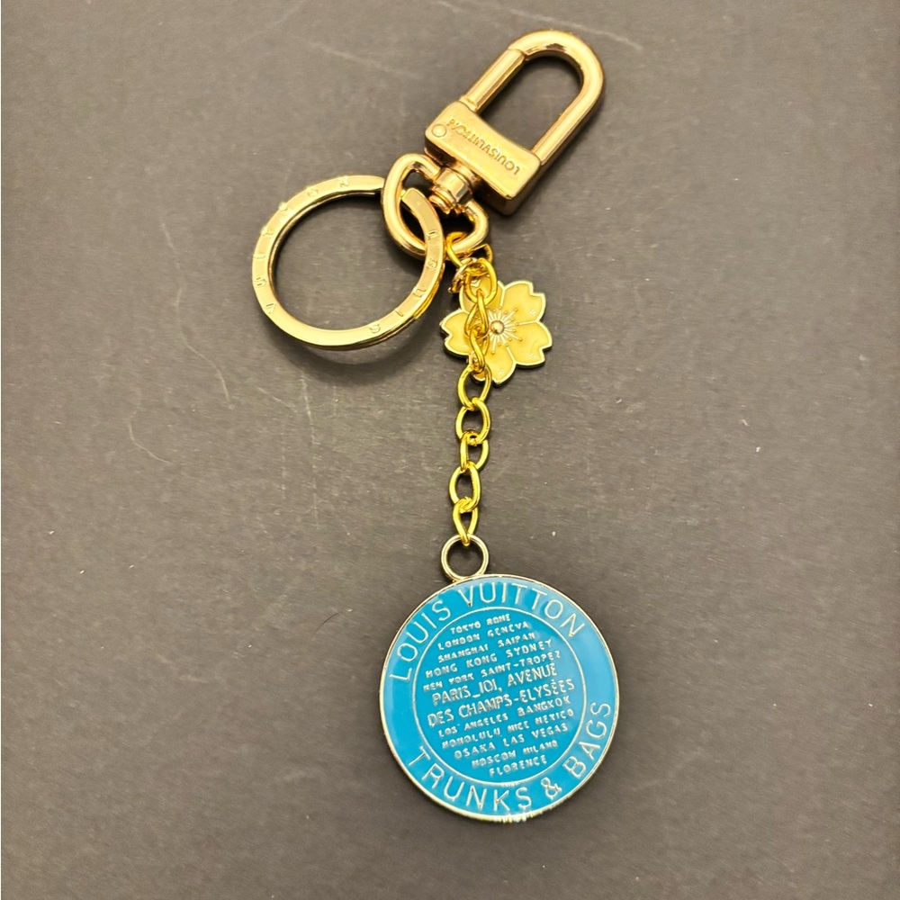 Gold and Blue Key chain.
